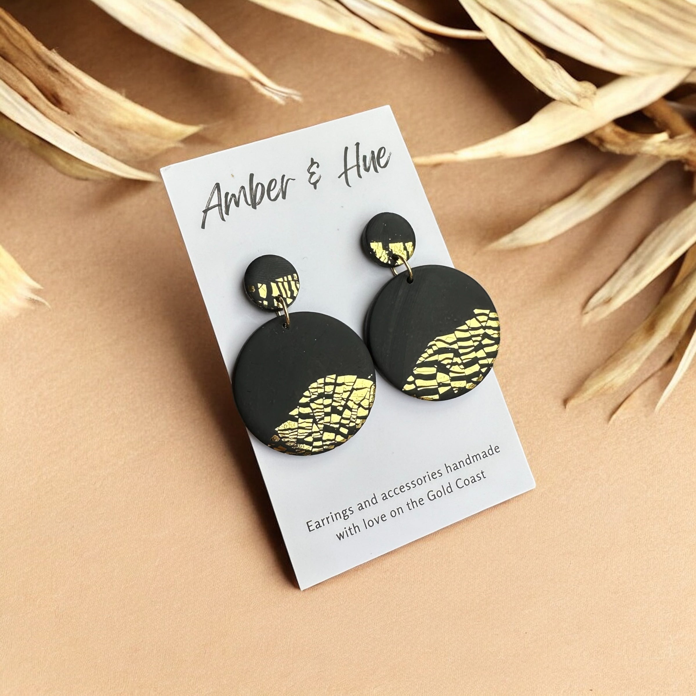 Circular Black and Gold Dangle Earrings